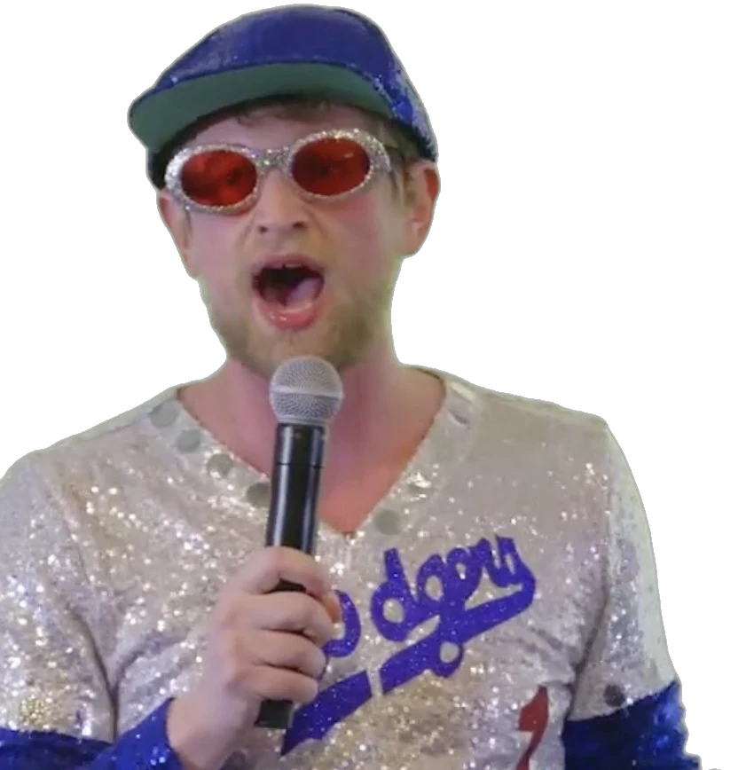 Josh in the full Elton John outfit, opening Experimentation Island